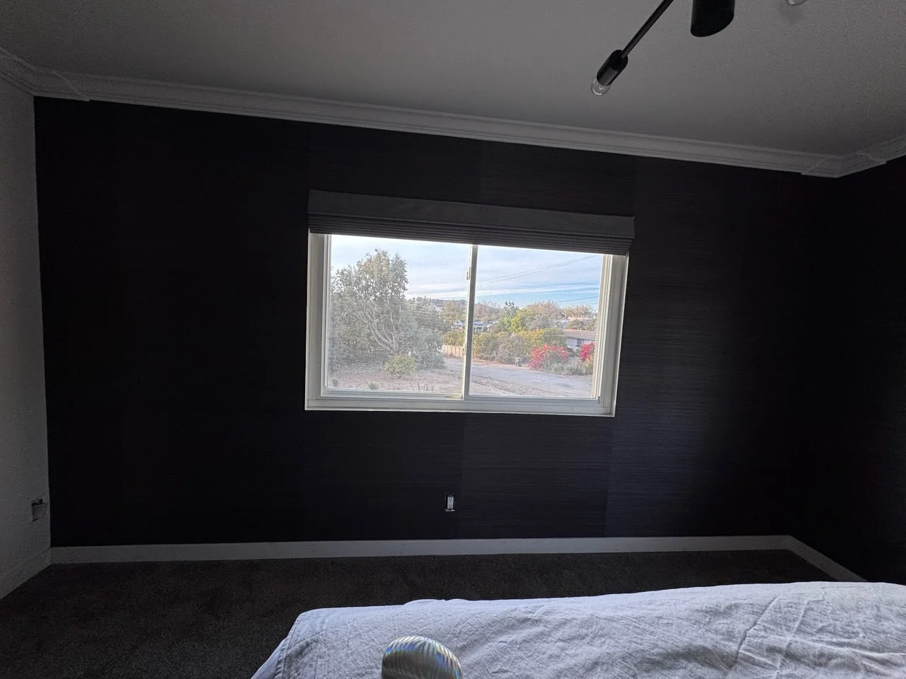 Wall surface preparation and priming before wallpaper install